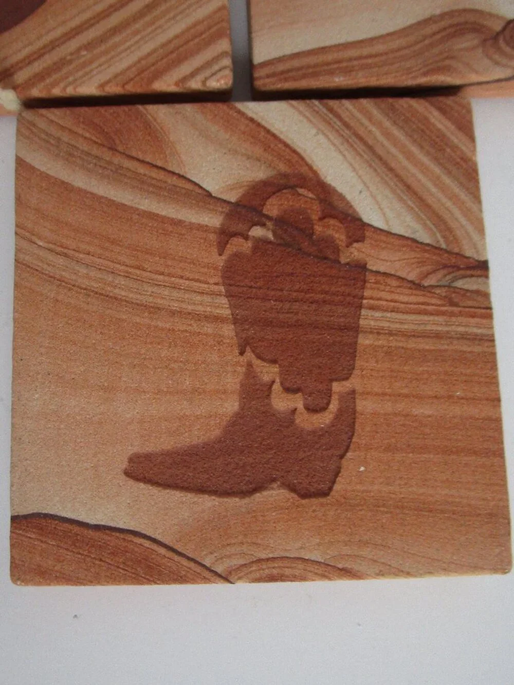 etched sandstone coaster set